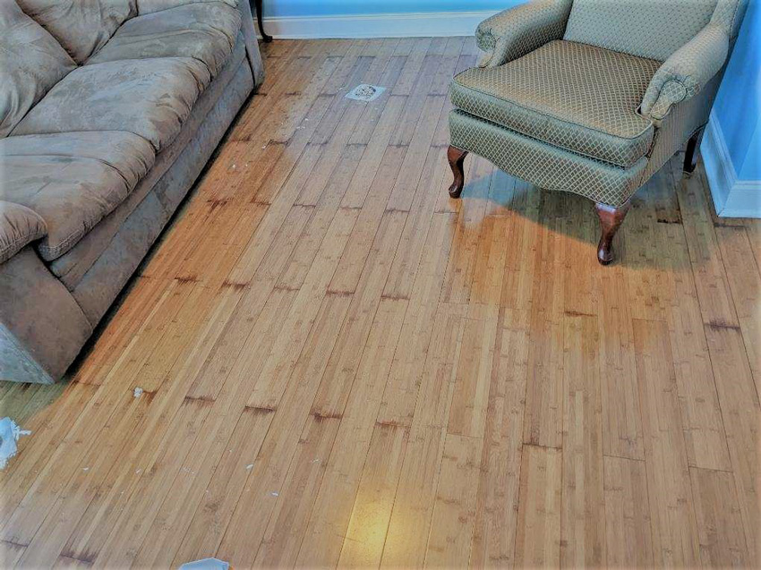 3. The wood floor had become saturated to the point where you can see water pooling up at every joint.